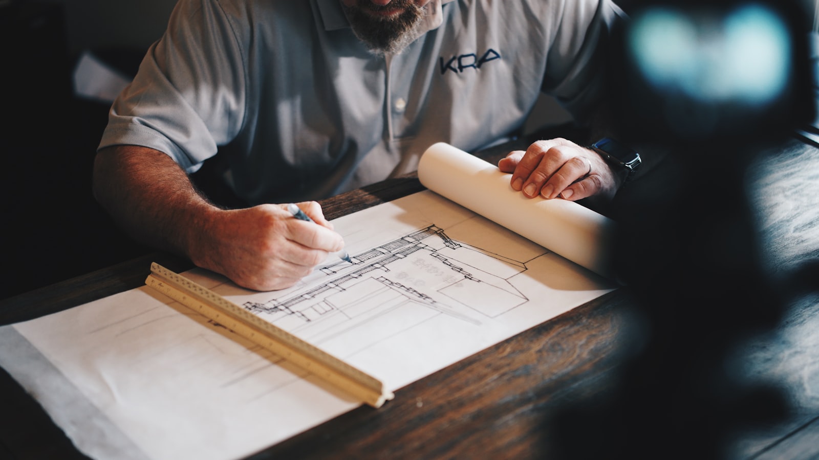 Engineer reviewing architectural building plans